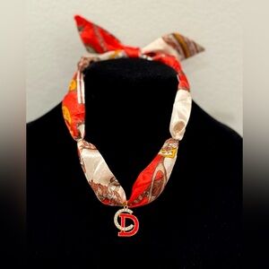 Elegant Red and Gold Scarf with Pendant Necklace